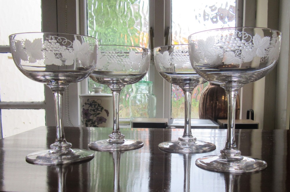 SET FOUR VICTORIAN ENGRAVED CHAMPAGNE GLASSES 