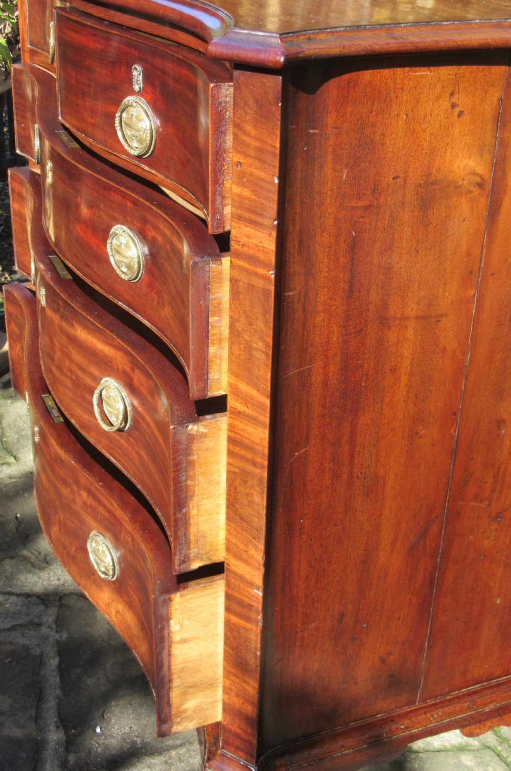 SMALL GEORGE III MAHOGANY SERPENTINE CHEST OF DRAWERS View VIII