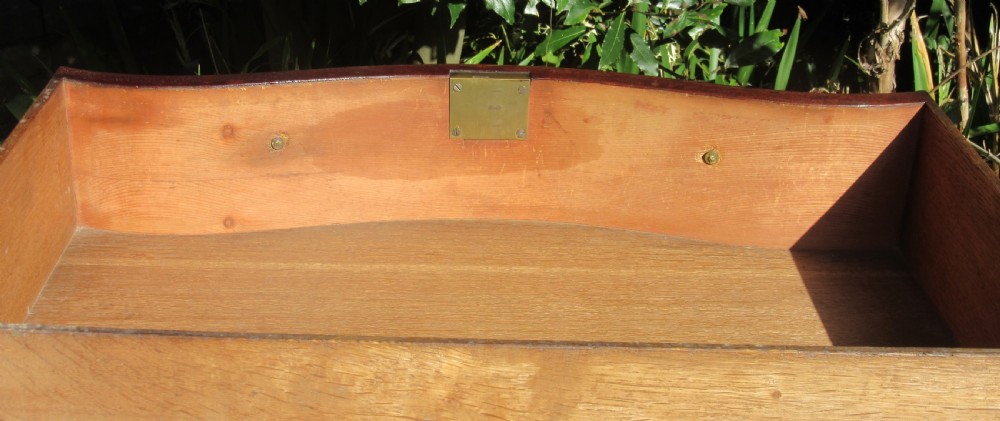 SMALL GEORGE III MAHOGANY SERPENTINE CHEST OF DRAWERS View XI