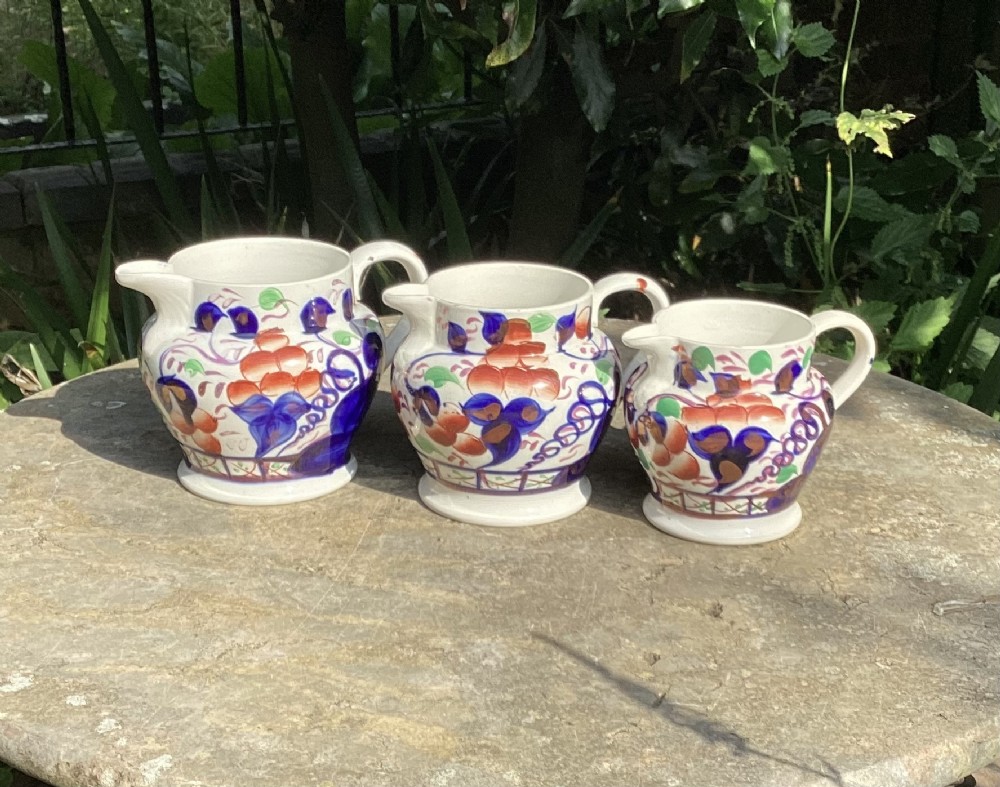 SET 3 GRADUATED COPPER LUSTRE JUGS c1880