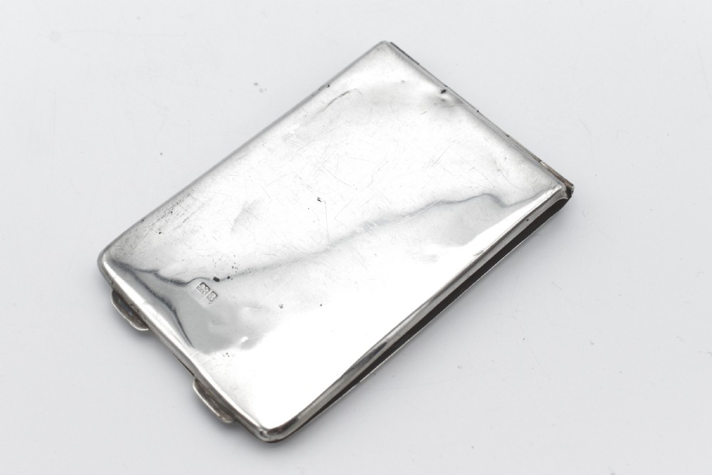 A rectangular sterling silver aide-memoire card case featuring a central hand-engraved cursive monogram M and hallmarks on the lower left corner. View II