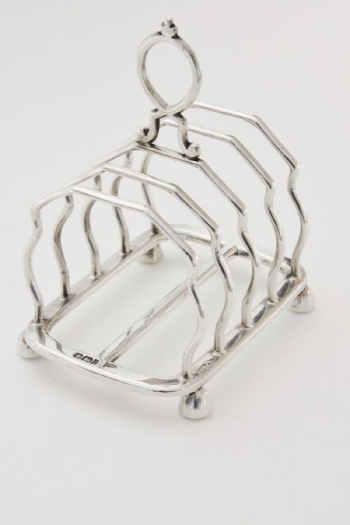 fig 1. Silver Four Slice Solid Toast Rack 1901