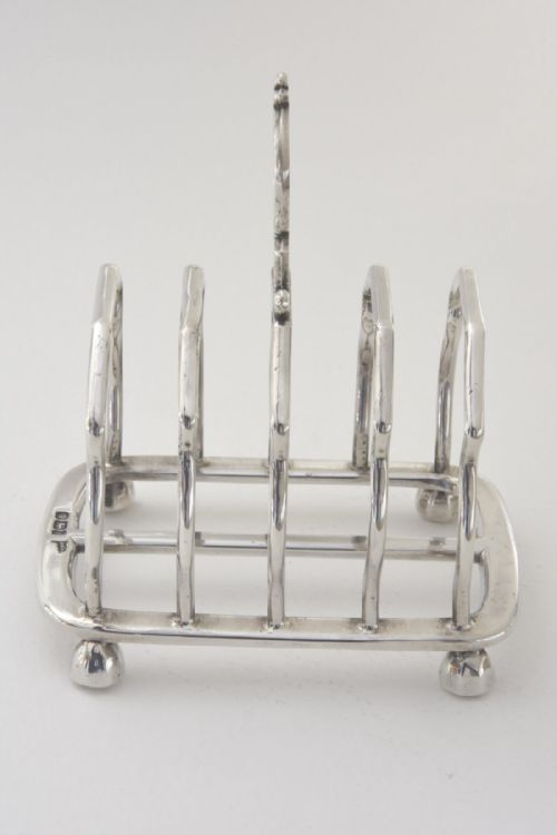 fig 3. Silver Four Slice Solid Toast Rack 1901