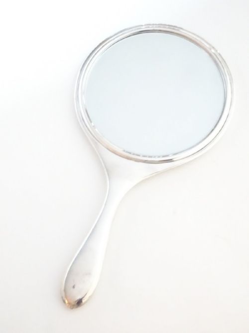 fig 3. Silver Hand Mirror 1921