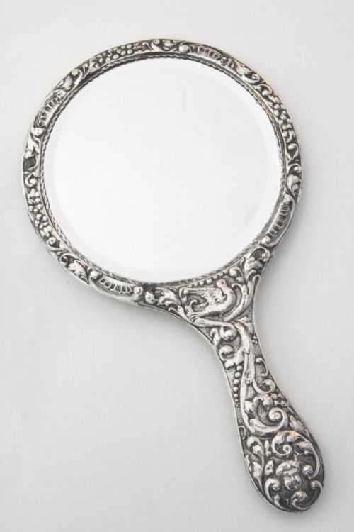 fig 2. Edwardian Embossed Silver Hand Mirror 1907