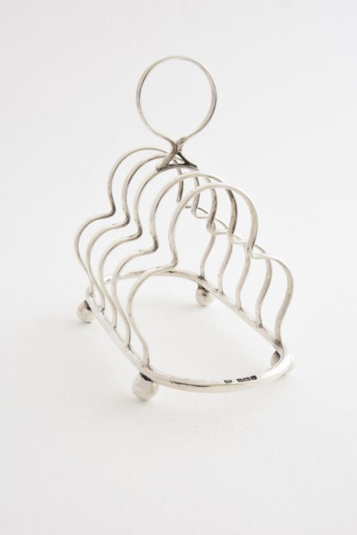 fig 1. Solid Silver Four Slice Toast Rack 1917