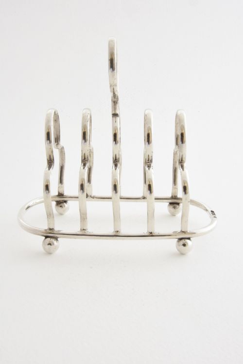 fig 3. Solid Silver Four Slice Toast Rack 1917