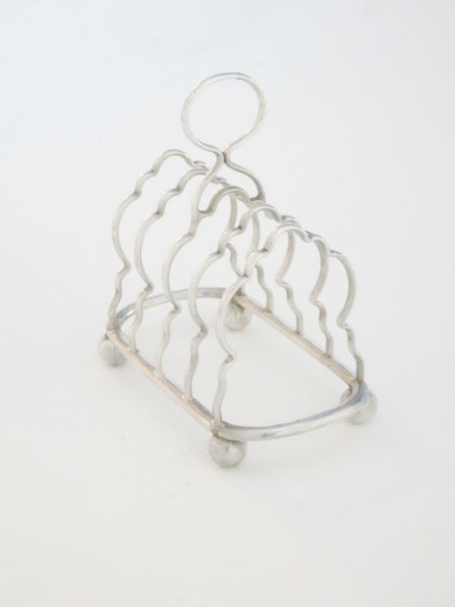 fig 1. Victorian Four Division Solid Silver Toast Rack 1900