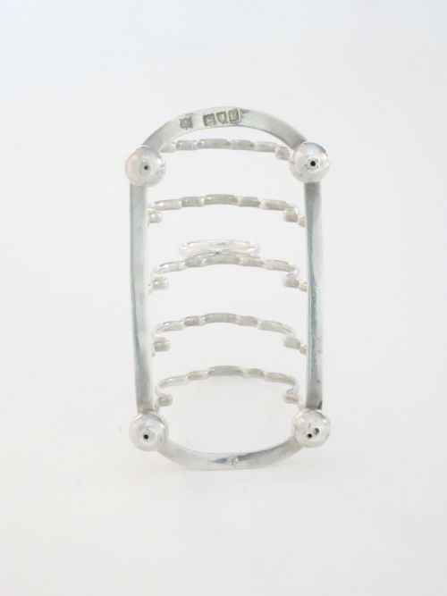 fig 2. Victorian Four Division Solid Silver Toast Rack 1900