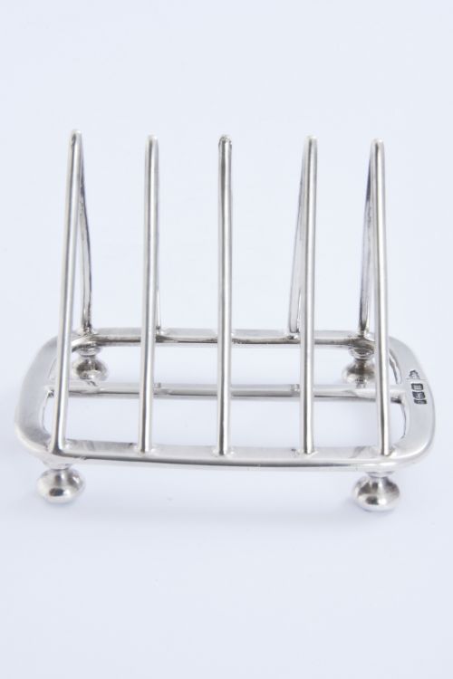 fig 3. Solid Silver Four Slice Toast Rack 1904