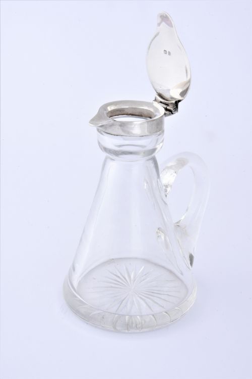 fig 3. Silver Mounted Whisky Noggin 1911