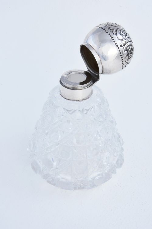 fig 1. Silver Mounted Cut Glass Perfume Bottle 1889