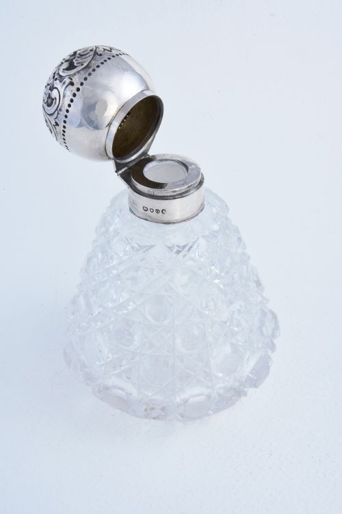 fig 3. Silver Mounted Cut Glass Perfume Bottle 1889