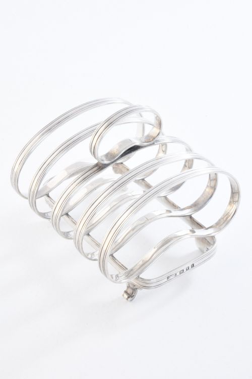 fig 1. Sterling Silver Four Slice Toast Rack 1934