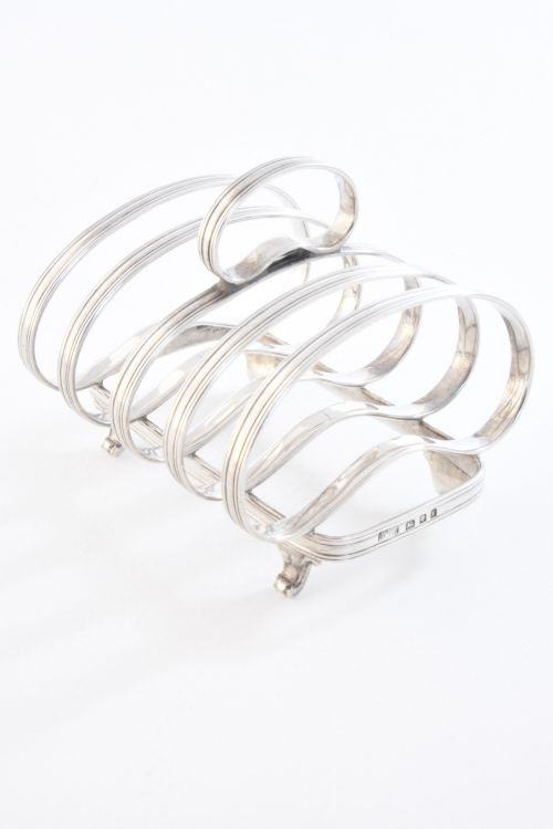 fig 2. Sterling Silver Four Slice Toast Rack 1934