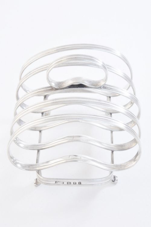 fig 4. Sterling Silver Four Slice Toast Rack 1934