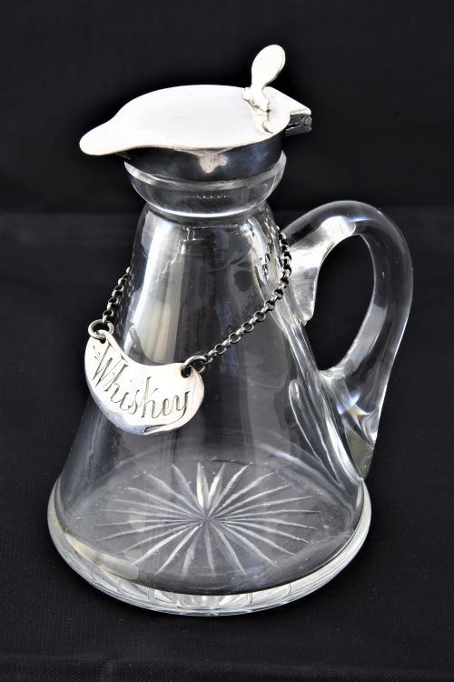 fig 1. Silver Mounted Whisky Noggin with Silver Label 1910