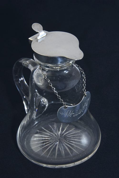 fig 1. Silver Mounted Whisky Noggin with Silver Label 1911