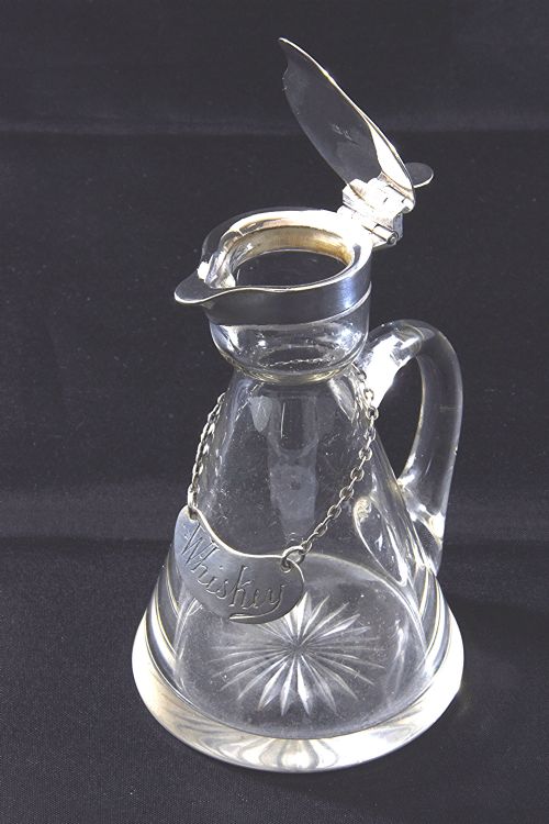 fig 4. Edwardian Silver Mounted Whisky Noggin & Label 1908