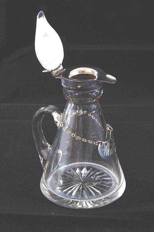 fig 4. Silver Mounted Whisky Noggin with Silver Label 1930