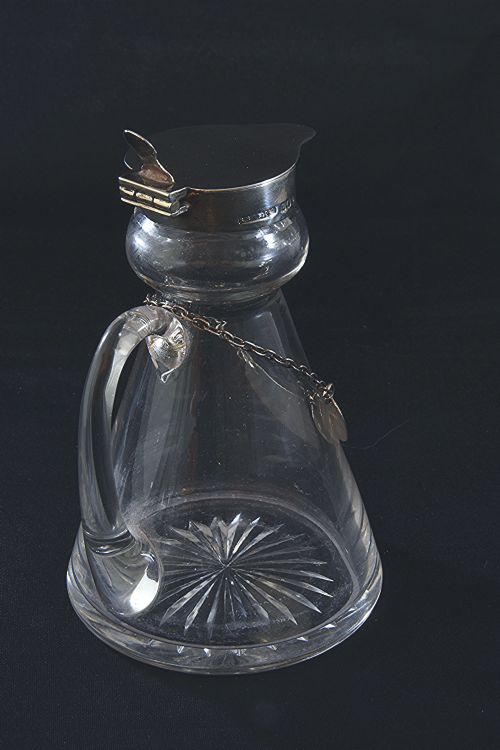 fig 3. Silver Mounted Whisky Noggin & Label 1935