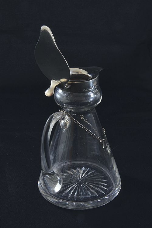 fig 5. Silver Mounted Whisky Noggin & Label 1935