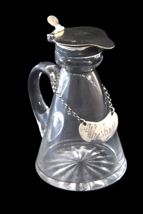 fig 1. Silver Mounted Whisky Noggin & Label 1917