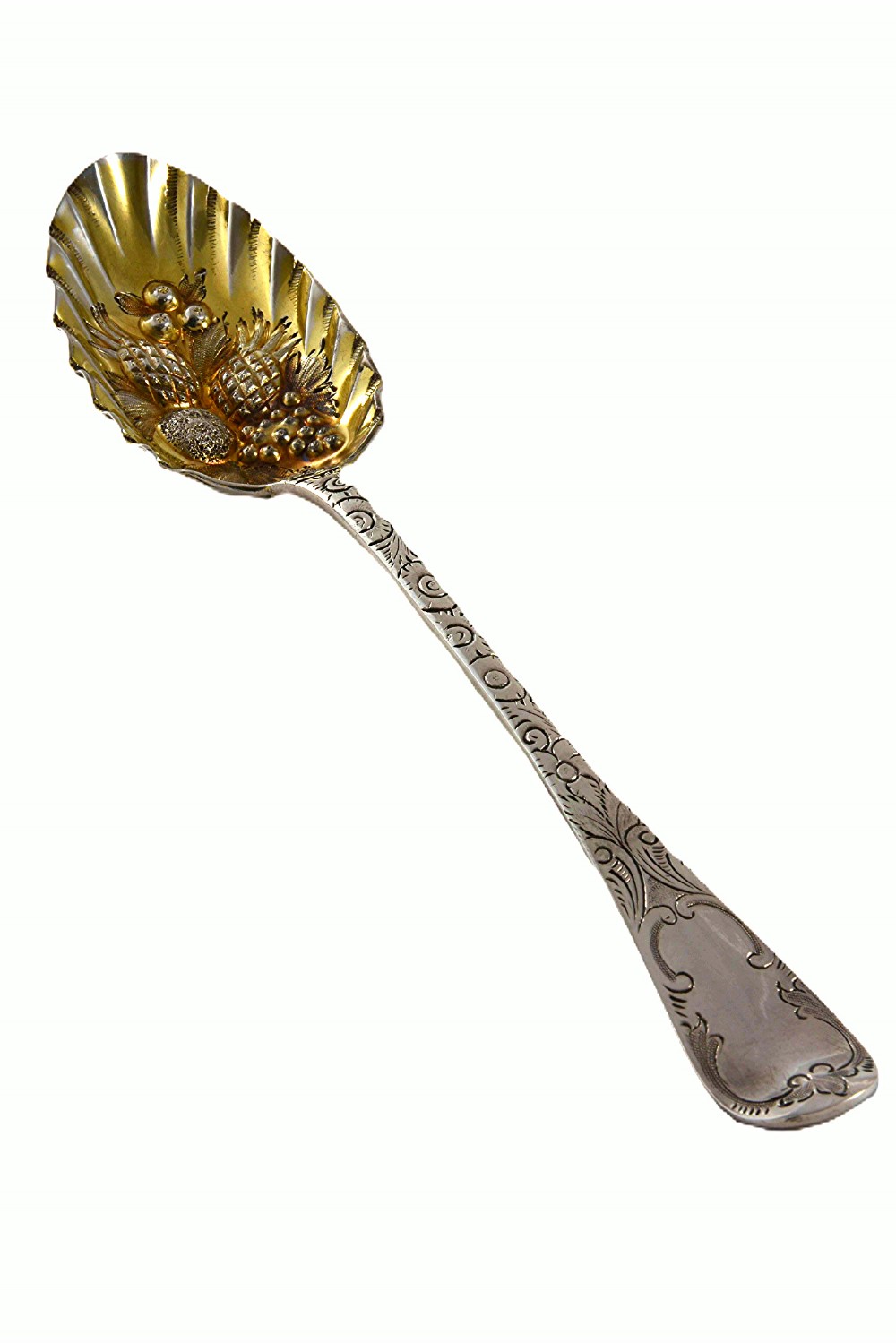 A Georgian sterling silver berry spoon with an engraved handle and a fluted, gilded bowl embossed with fruits.