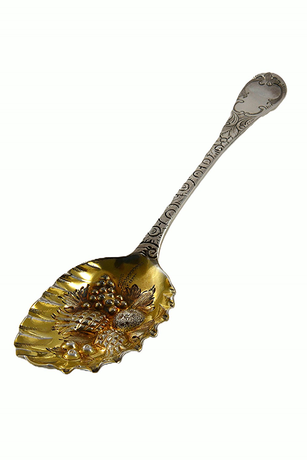 A Georgian sterling silver berry spoon with an engraved handle and a fluted, gilded bowl embossed with fruits. View II