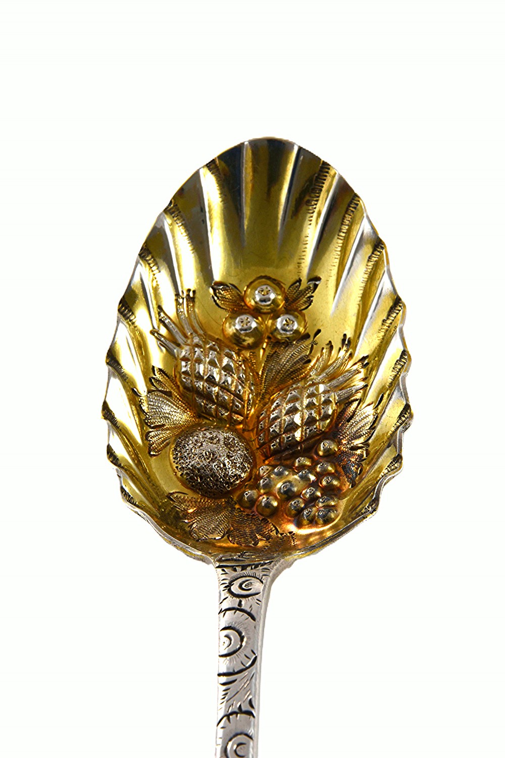 A Georgian sterling silver berry spoon with an engraved handle and a fluted, gilded bowl embossed with fruits. View III
