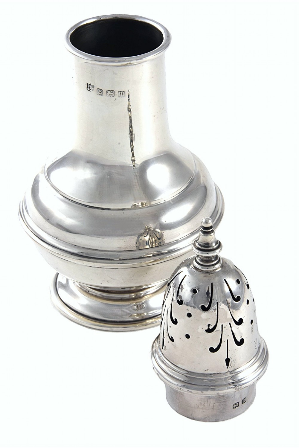A George V sterling silver sugar caster featuring a pierced dome lid with finial, baluster body, stepped base, and visible hallmarks. View III