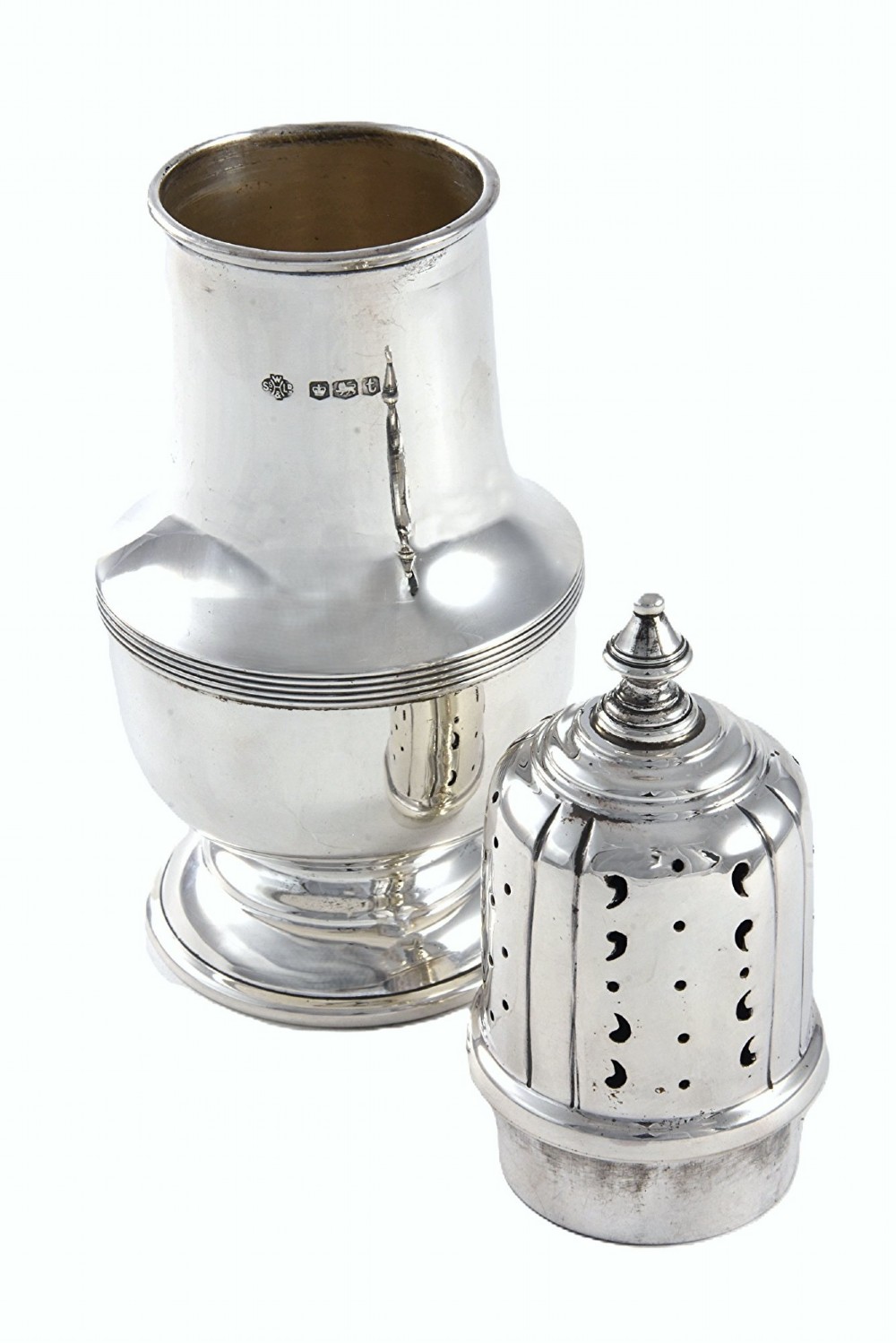 A solid sterling silver sugar caster featuring a baluster-shaped body, pierced dome lid with finial, and British hallmarks on the side. View III