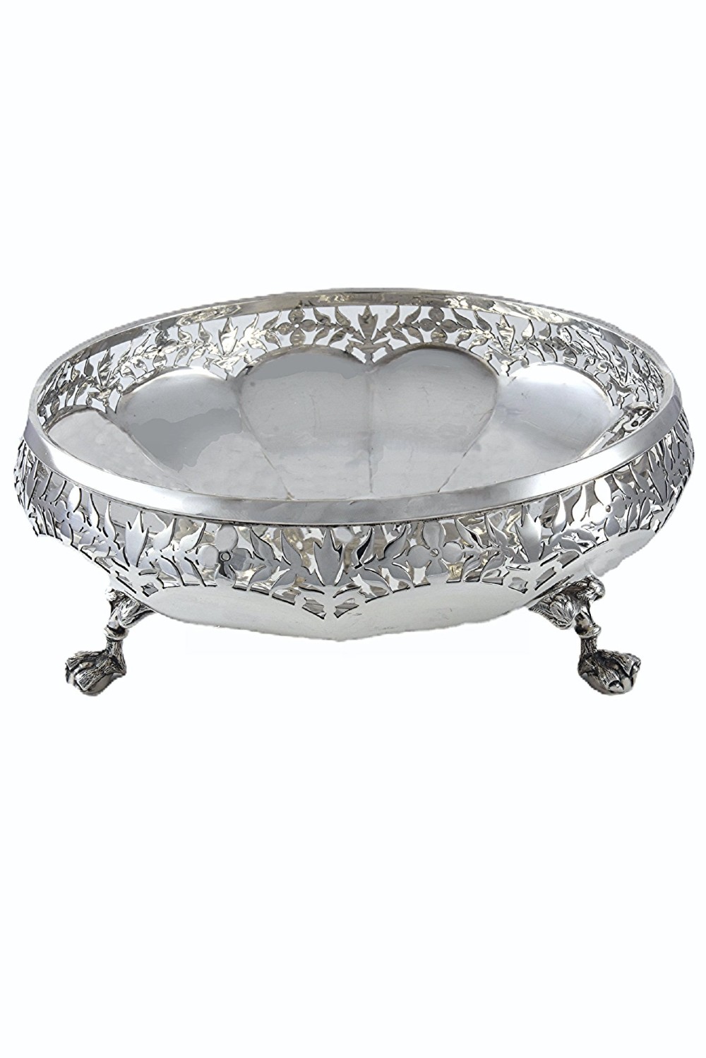 A shallow circular silver centrepiece bowl featuring intricate pierced fretwork around the border and supported by four cast claw feet. View II