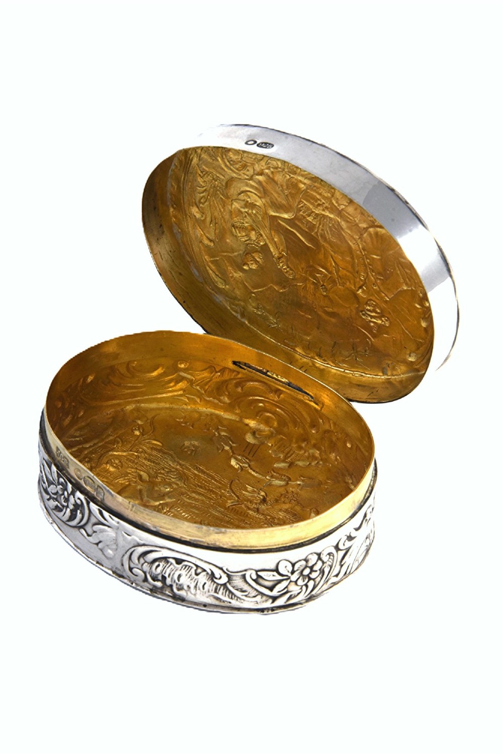 An oval sterling silver Edwardian snuff box with a relief scene on the hinged lid and floral scrollwork around the sides. View III