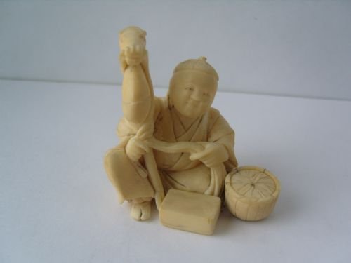 Stunning Japanese Ivory Okimono Carving of a Man Making a Hobby Horse