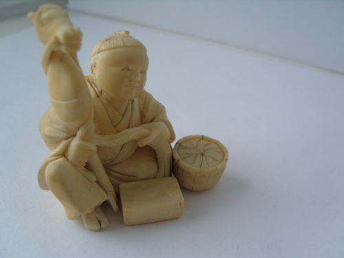 fig 2. Stunning Japanese Ivory Okimono Carving Of A Man Making A Hobby Horse