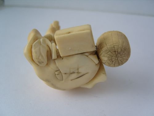 fig 3. Stunning Japanese Ivory Okimono Carving Of A Man Making A Hobby Horse