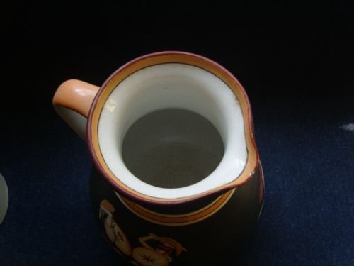 fig 2. A 19TH CENTURY ' ENCAUSTIC' WARE STAFFORDSHIRE POTTERY JUG