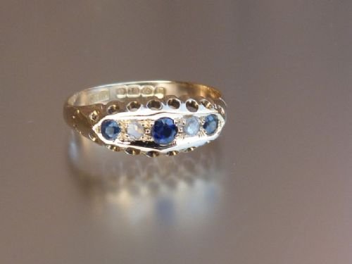 fig 1. Stunning 18ct gold hallmarked diamond and sapphire ring.