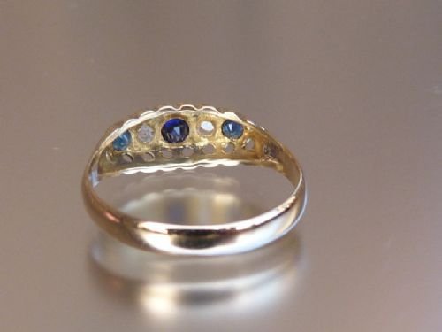 fig 2. Stunning 18ct gold hallmarked diamond and sapphire ring.