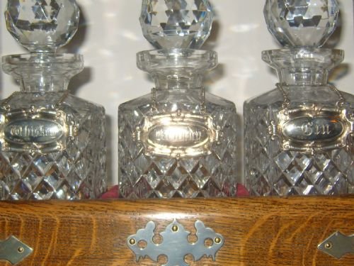 fig 1. Outstanding Edwardian Oak Three Bottle Tantalus