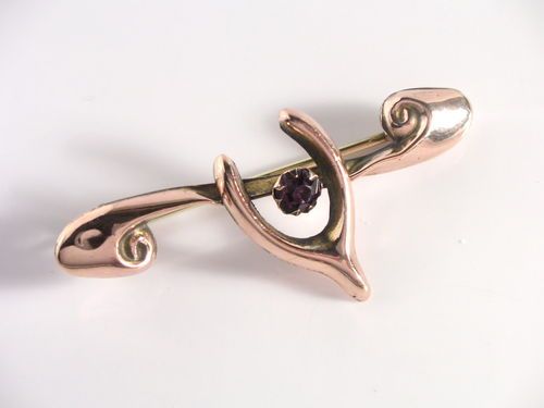 fig 1. VICTORIAN 9CT ROSE GOLD AMETHYST WISHBONE BROOCH