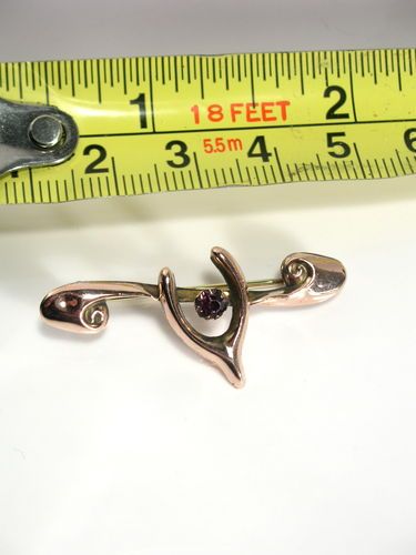 fig 2. VICTORIAN 9CT ROSE GOLD AMETHYST WISHBONE BROOCH