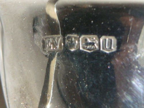 fig 3. SILVER SAUCE BOAT WITH SCALLOPED EDGE ON THREE FEET BY VINERS 1937