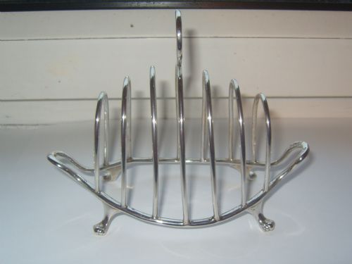 fig 2. 
Superb Victorian hallmarked silver six division toast rack. 112g Sheffield 1893
  
