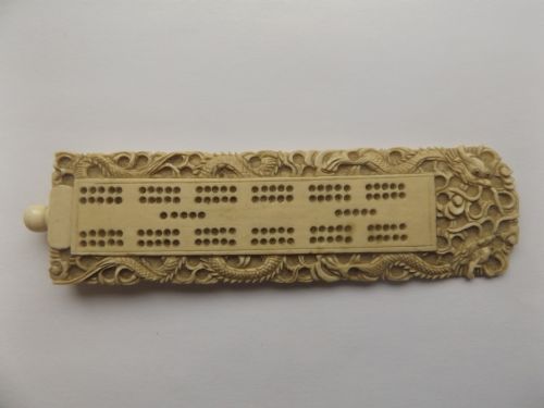 Stunning Chinese Ivory Cribbage Board Decorated with Dragons.