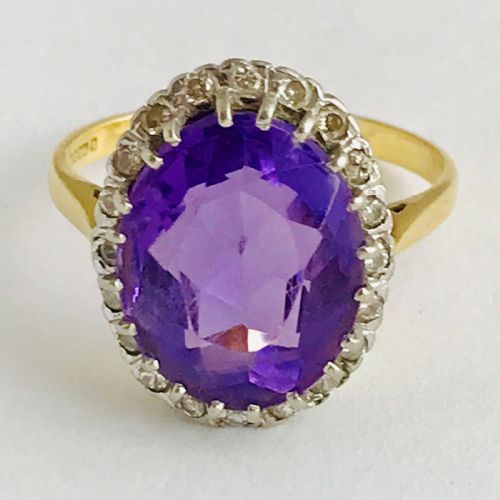A Large Violet 8ct Amethyst Surrounded by Diamonds
