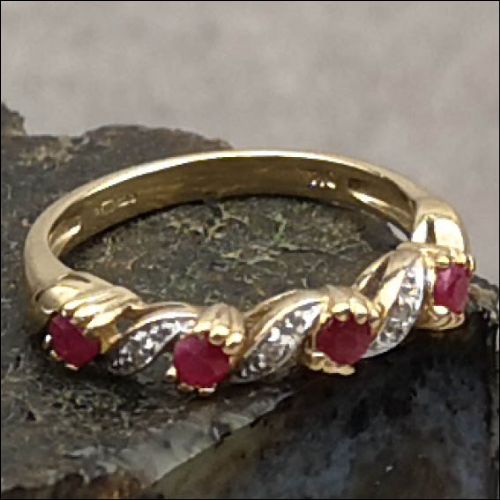 Unusual9ct Gold Diamond & Ruby Seven Stone Ring