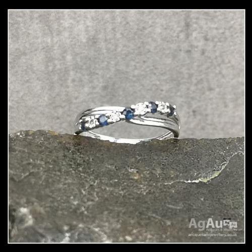 fig 1. 9ct White Gold Sapphire & Diamond Crossover Ring