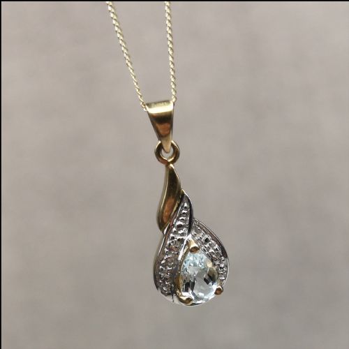 9ct Gold Pear Drop Blue Topaz and Diamond Necklace